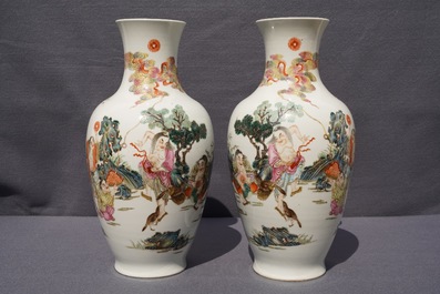 A pair of Chinese famille rose vases, Qianlong mark, 20th C.