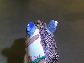 A fine pair of polychrome petit feu and gilded Dutch Delft models of horses, 1st half 18th C.