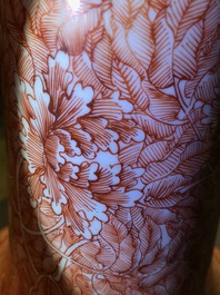 A Chinese iron red 'dragon and phoenix' bottle vase, 19th C.