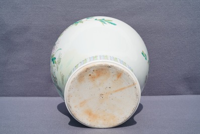 A Chinese famille rose vase with a bird on a flowering branch, 19th C.