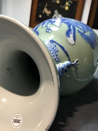A pair of Chinese blue and white on celadon ground 'immortals' vases, 19th C.