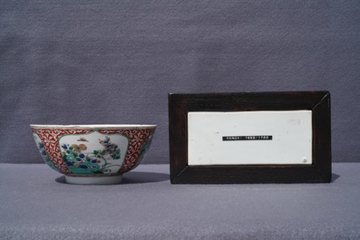 A Chinese famille verte plaque with playing boys and a landscape bowl, Kangxi