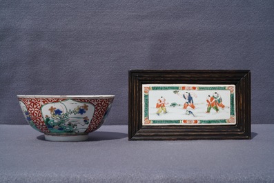 A Chinese famille verte plaque with playing boys and a landscape bowl, Kangxi