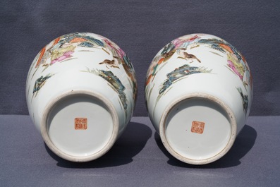 A pair of Chinese famille rose vases, Qianlong mark, 20th C.