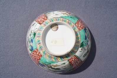 A Chinese famille verte plaque with playing boys and a landscape bowl, Kangxi