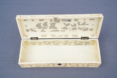 A Chinese carved ivory casket, a cardholder and a notebook, Canton, 19th C.
