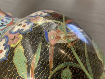 A pair of Chinese cloisonn&eacute; bottle vases, 19th C.