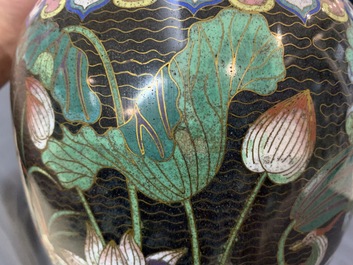 A pair of Chinese cloisonn&eacute; bottle vases, 19th C.