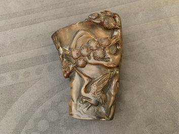A Chinese jade archer's ring, a horn libation cup and a Beijing glass brush washer, 18th C. and later