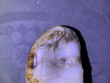 A Chinese greyish-white and russet jade snuff bottle, 19/20th C.