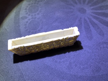 A Chinese carved ivory casket, a cardholder and a notebook, Canton, 19th C.