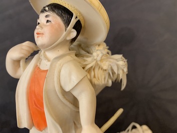 A polychrome Chinese ivory group with a shepherd, ca. 1940