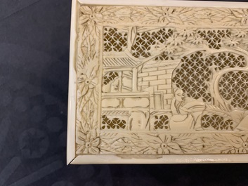 A Chinese carved ivory casket, a cardholder and a notebook, Canton, 19th C.