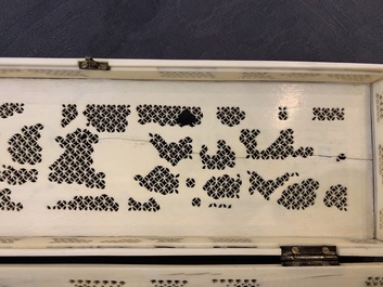 A Chinese carved ivory casket, a cardholder and a notebook, Canton, 19th C.