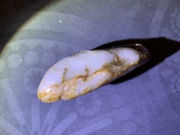 A Chinese greyish-white and russet jade snuff bottle, 19/20th C.