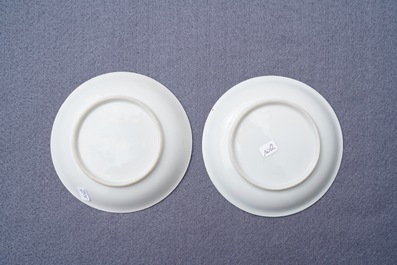 A pair of Chinese famille rose 'roosters' cups and saucers, Yongzheng/Qianlong