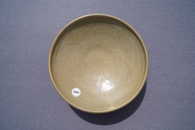 A Chinese Yaozhou celadon bowl with incised floral design, Song