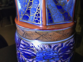 A Chinese blue and white vase with European clobbered decoration, Kangxi