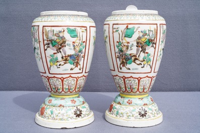 A pair of Chinese famille verte urns, 19th C.