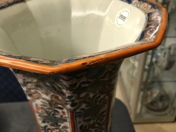 A Chinese blue and white vase with European clobbered decoration, Kangxi