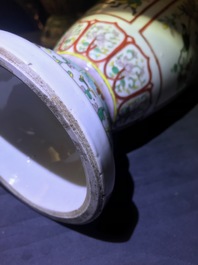 A pair of Chinese famille verte urns, 19th C.