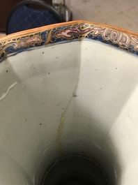 A Chinese blue and white vase with European clobbered decoration, Kangxi