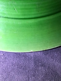 A Chinese famille verte dish and a monochrome green plate, Kangxi