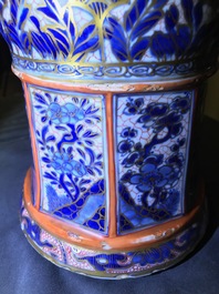 A Chinese blue and white vase with European clobbered decoration, Kangxi
