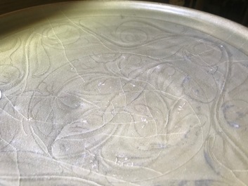 A Chinese Yaozhou celadon bowl with incised floral design, Song