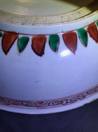 A Chinese famille verte dish and a monochrome green plate, Kangxi