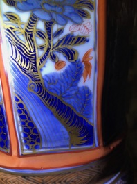 A Chinese blue and white vase with European clobbered decoration, Kangxi