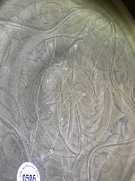 A Chinese Yaozhou celadon bowl with incised floral design, Song