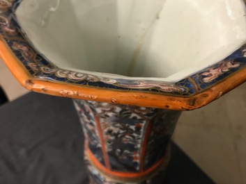 A Chinese blue and white vase with European clobbered decoration, Kangxi