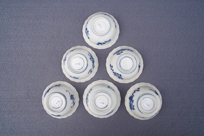 Twelve Chinese blue and white cups and saucers with floral design, Kangxi/Qianlong