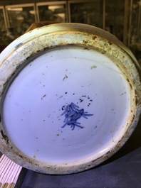 A Chinese blue and white vase with European clobbered decoration, Kangxi