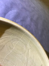 A Chinese Yaozhou celadon bowl with incised floral design, Song