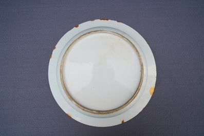 A pair of Chinese blue and white basins with figures in a garden, Yongzheng