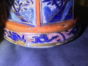 A Chinese blue and white vase with European clobbered decoration, Kangxi