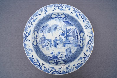 A pair of Chinese blue and white basins with figures in a garden, Yongzheng