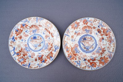 Four Chinese Imari-style plates with raised central roundels, Kangxi