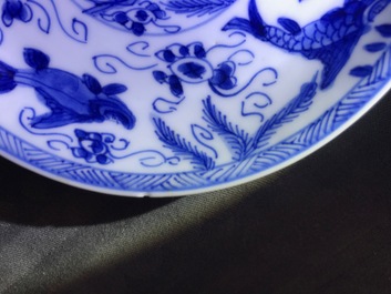 Six Chinese celadon and blue and white 'crabs and fish' cups and saucers, Kangxi