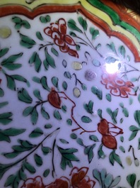 A Chinese famille verte dish and a monochrome green plate, Kangxi