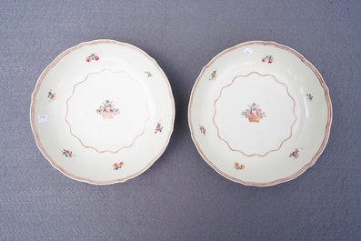 Two Chinese famille rose teapots and covers and two sets of cups and saucers, Qianlong