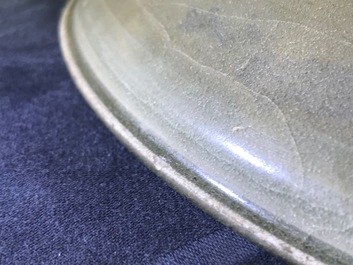 A Chinese Yaozhou celadon bowl with incised floral design, Song