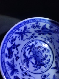 Six Chinese celadon and blue and white 'crabs and fish' cups and saucers, Kangxi
