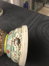 A pair of Chinese famille verte urns, 19th C.
