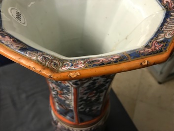 A Chinese blue and white vase with European clobbered decoration, Kangxi