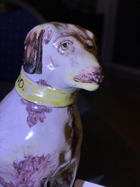 A manganese and yellow Brussels faience model of a dog, 18th C.
