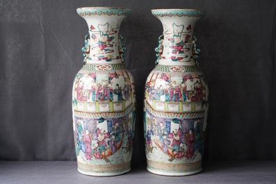 A pair of Chinese famille rose 'immortals' vases, 19th C.