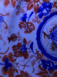 Four Chinese Imari-style plates with raised central roundels, Kangxi